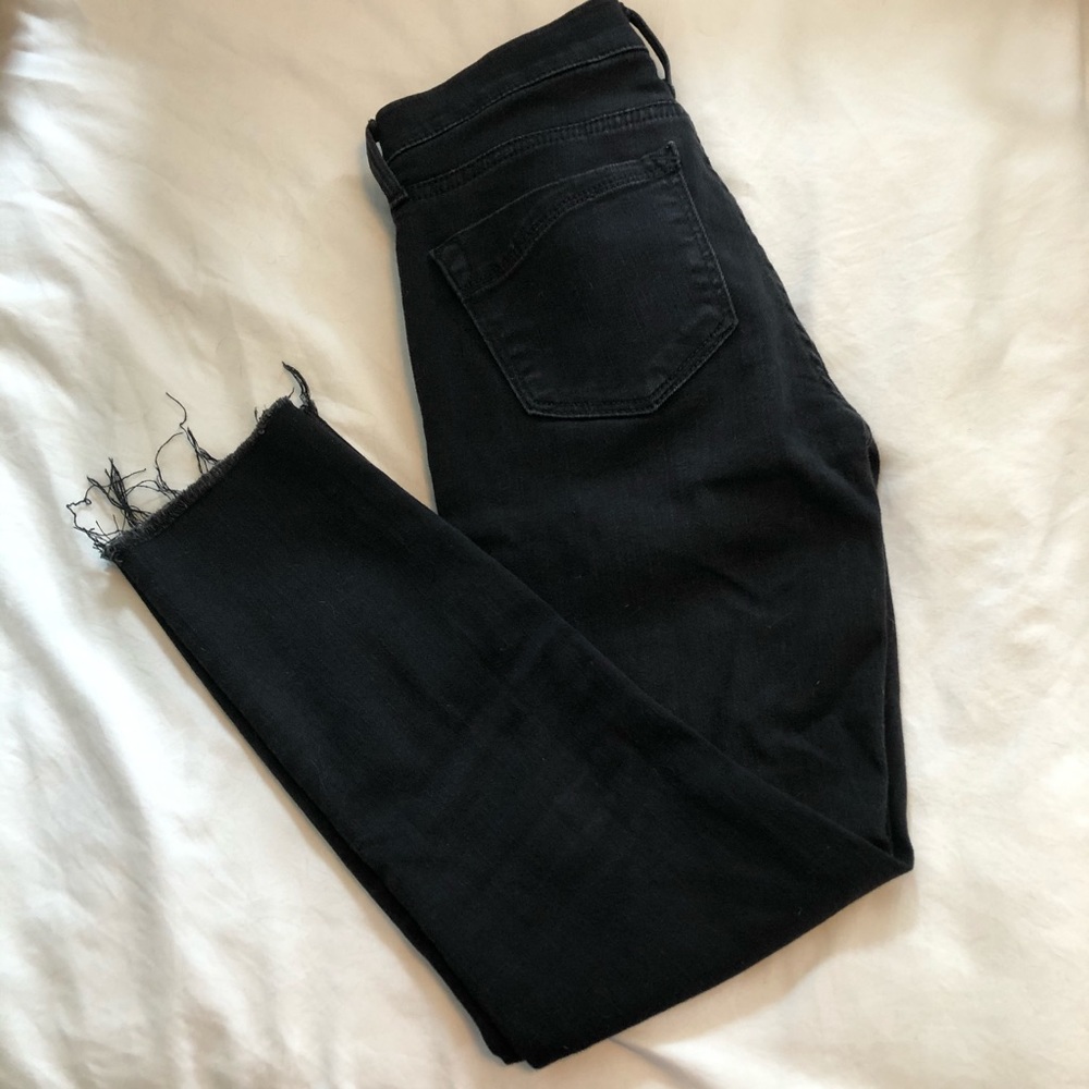 Black jeans with fringe bottom